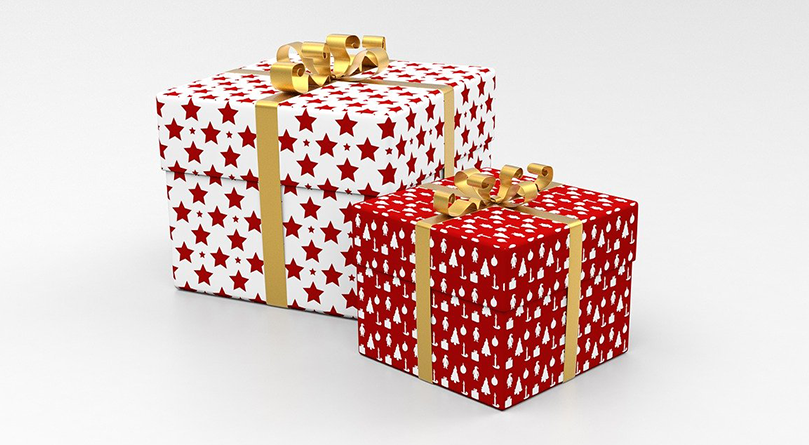 Two gifts wrapped in star paper